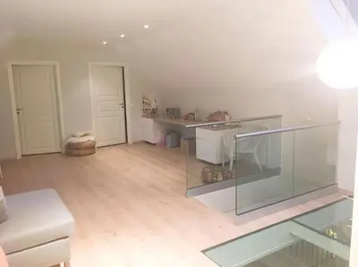 a white living room with a glass counter in it at Hus i Stryn in Stryn