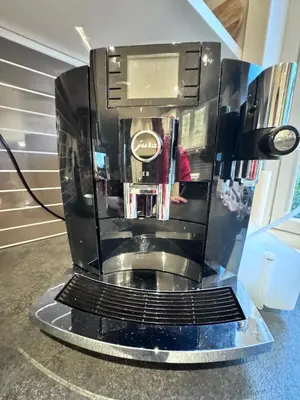 a coffee machine sitting on top of a counter at Ålesund sentrum apartment in Ålesund