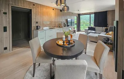a kitchen and dining room with a table and chairs at Amazing Apartment In Hemsedal With Wifi in Hemsedal