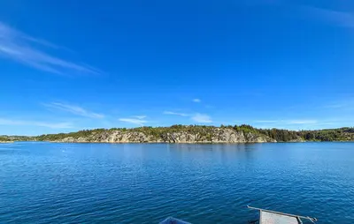 an island in the middle of a large body of water at Lovely Home In Urangsvåg in Steinsbø