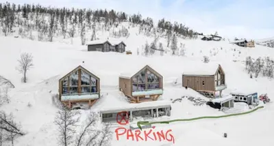 an aerial view of a house in the snow at Flygende utsiktshytte med magisk utsikt in Sogndal