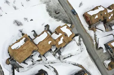 an aerial view of a building in the snow at Cozy Ski-In Ski-Out Apartment on Geilo, Stunning Views! in Geilo