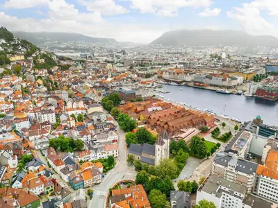 an aerial view of a city with a river at Homerentals Apartments - Behind Bryggen & historic cobblestone streets - 2 Floor renovated from february 2025 in Bergen
