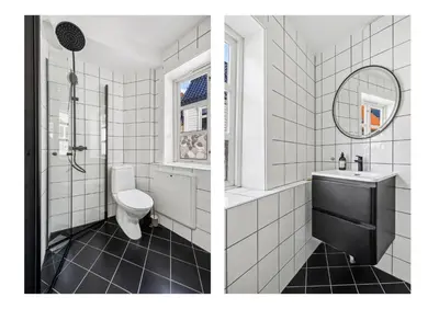 a bathroom with a toilet and a sink and a mirror at Homerentals Apartments - Behind Bryggen & historic cobblestone streets - 2 Floor renovated from february 2025 in Bergen