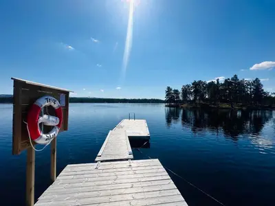 a dock in the middle of a lake at Nydelig naturperle på Nesbyen, nær Langedrag in Nesbyen