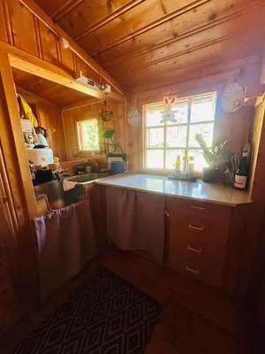 a kitchen with a sink and a counter top at Nydelig naturperle på Nesbyen, nær Langedrag in Nesbyen