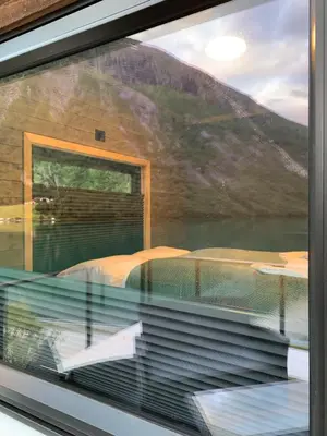 a view of a window with a view of a lake at Stryn Golden Resort - Panorama II in Stryn