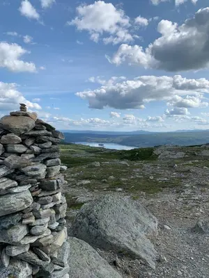 a stack of rocks on top of a mountain at Ideal For Families And Groups Near Ski Slopes And Amenities in Beitostøl