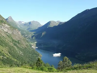 a lake in the middle of a mountain valley at 9 person holiday home in Farstad-By Traum in Farstad
