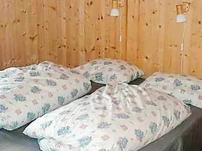 two pillows sitting on a bed in a room at 6 person holiday home in NESBYEN-By Traum in Nesbyen