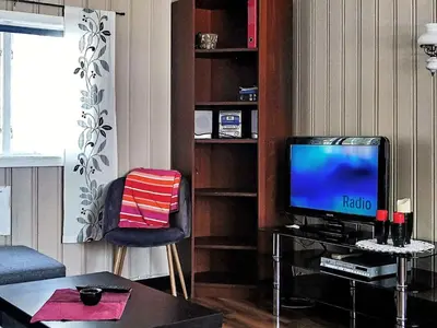 a living room with a television on a table at 6 person holiday home in Øvre Årdal in Øvre Årdal