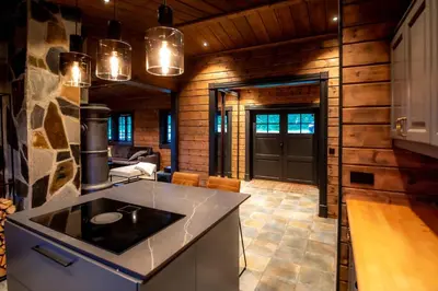 a kitchen with a counter and a sink in a room at Trysilfjellet Nord 170 in Trysil