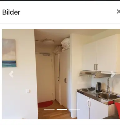 a kitchen with white cabinets and a sink at Hybelleilighet 4 pers ski-VM 2025 in Trondheim
