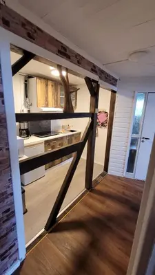 a kitchen with a counter and a counter top in a room at Apartment Fjordblick in Leikanger