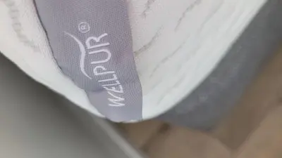 a close up of a tie on a persons leg at Apartment Fjordblick in Leikanger