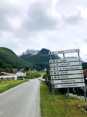a street sign on the side of a road at Flat in the center of Loen in Loen