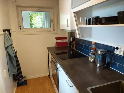 a kitchen with a sink and a counter top at Norwegian Fjords Time Out in Stranda