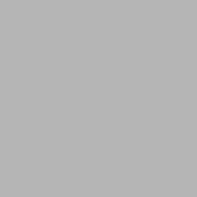 a woman laying on top of a hill with a dog at Holiday cabins with unmatched lake view in Jølster in Skei