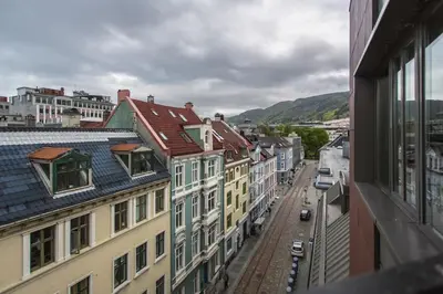 a view from a window of a city with buildings at Dinbnb Apartments I Penthouse 250m From City Center I Privat Balcony in Bergen