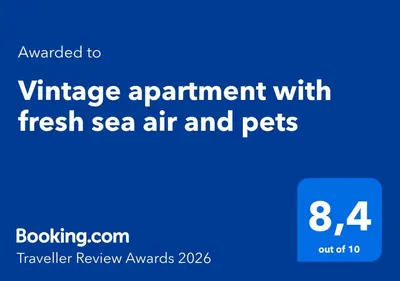 a blue sign that says vintage appointment with fresh sea air and pets at Vintage apartment with fresh sea air and pets in Kristiansund