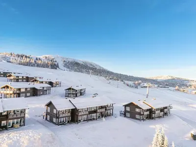 an aerial view of a resort in the snow at Leilighet på Bualie, Golsfjellet in Gol