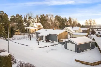 a group of houses in the snow at Villekulla - Koselig hus med jazzuci i Hamar in Hamar
