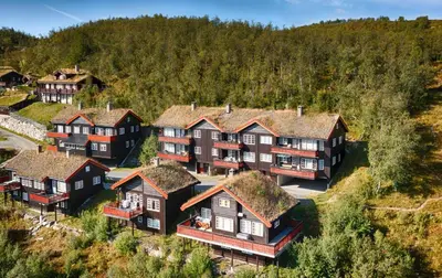 an aerial view of a home in a hill at Steps From The Slopes With Stunning Views! in Beitostøl