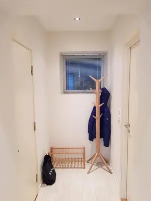 a corner of a room with a room with a punching at Moderne leilighet nær sentrum in Ålesund