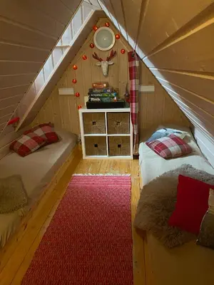 a room with two beds in a tent at Perfect Retreat for Small Families in Beitostøl