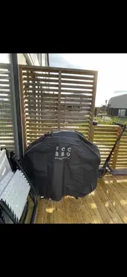 a black bag sitting on top of a wooden deck at Rekkehus til SKI-VM in Lund