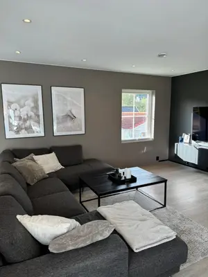 a living room with a couch and a table at Big 2 bedrooms apartment 10 min from Granåsen, VM2025 in Trondheim
