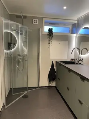 a bathroom with a shower and a sink at Entire house less than 2 km from Granåsen, WC 2025 in Trondheim