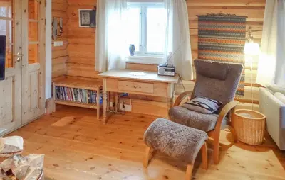 a room with a desk and a chair and a window at 2 Bedroom Lovely Home In Oppdal in Oppdal
