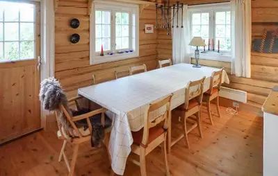 a dining room with a table and chairs at 2 Bedroom Lovely Home In Oppdal in Oppdal