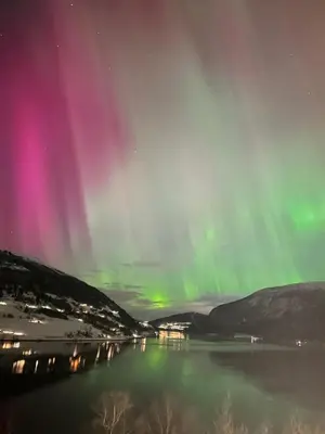 an image of the aurora borealis over a lake at Olden Apartment with Panorama view in Olden
