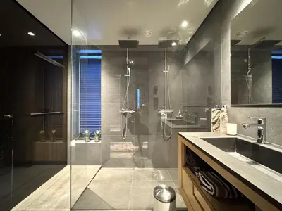 a bathroom with a shower and a sink at Spacious, exclusive and modern cabin in Geilo in Geilo