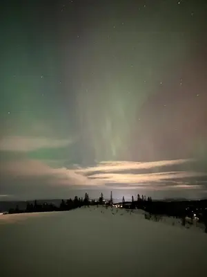 a view of the night sky with a field of snow at Nydelig utsikt, ski in out, 3 soverom in Aurdal