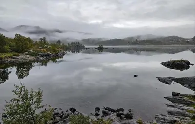 a large body of water with clouds in the water at 5 Bedroom Nice Home In Edland in Vågsli