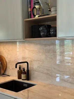 a kitchen with a sink and a counter top at Vakreste plass og beliggenhet! in Trondheim