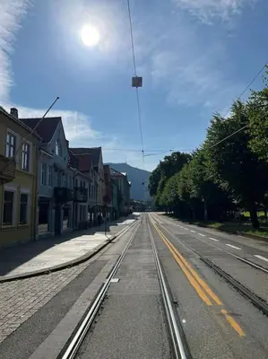 an empty street in a small town with houses at Stylish place in the heart of Bergen in Bergen