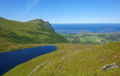 a view from the top of a mountain with a lake at Nice Home In Farstad With Wifi in Farstad