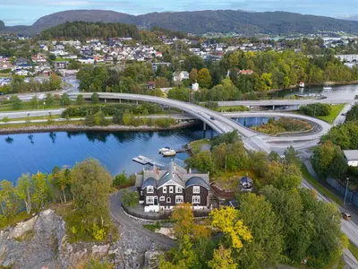 an aerial view of a town with a bridge over a river at Jervell 3 Bnb in Ålesund