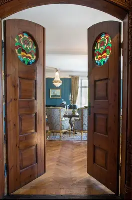 an open door into a living room with a table at Jervell 3 Bnb in Ålesund