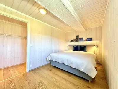 a bedroom with a bed in a room at Modern apartment in the heart of Geilo center in Geilo