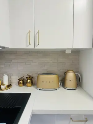 a kitchen with two toaster and tea pots on a counter at Trondheim- free parking in Høiset