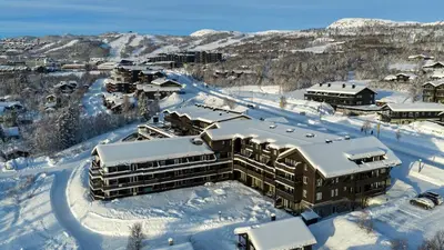an aerial view of a resort in the snow at Ideal Family Retreat With 3 Bedrooms in Beitostøl
