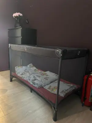 a bunk bed with two pillows on it in a room at Delikat og moderne rekkehus in Lillehammer