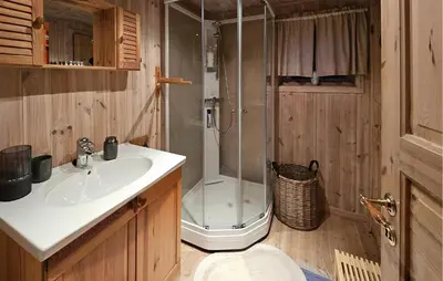 a bathroom with a shower and a sink at Gorgeous Home In Tuddal in Tuddal