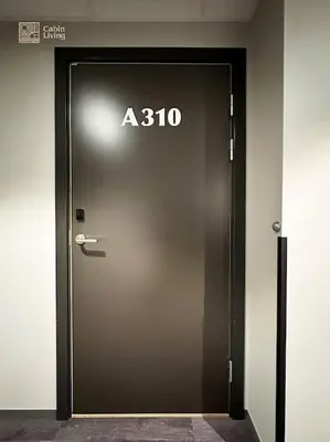 a elevator door with a sign on it at Modern Apartment in Trysil Lodge Ski in out in Trysil