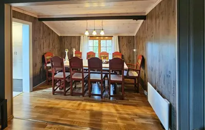 a dining room with a table and chairs at 3 Bedroom Amazing Home In Eggedal in Eggedal